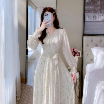 Women's dress with puffy sleeves and a V-shaped neckline