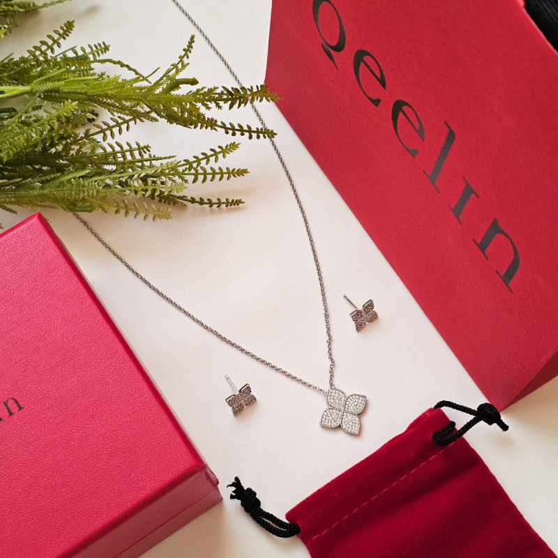 طقم سلسال وحلق من ماركة كوين