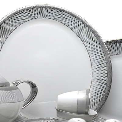 طقم سفرة بورسلان ابيض بحواف فضي 110 قطعة