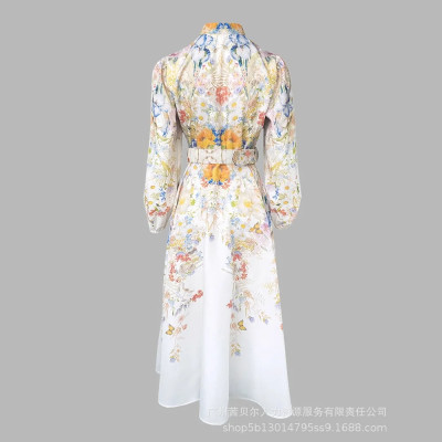 فستان نسائي ميدي منقوش وكأنه لوحة تنبض بالحياة بتص...