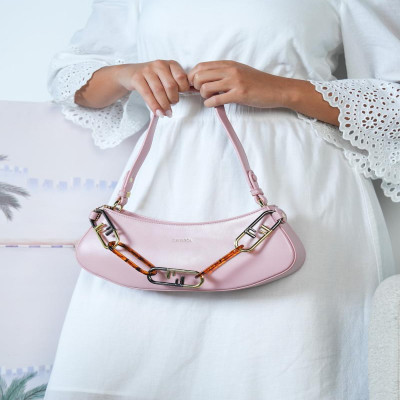 ‎ شنطة نسائية باللون الوردي