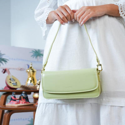 ‎ شنطة نسائية باللون الأخضر الفاتح