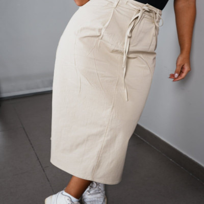 ‎ تنورة نسائية بتصميم أنيق بلون بيج