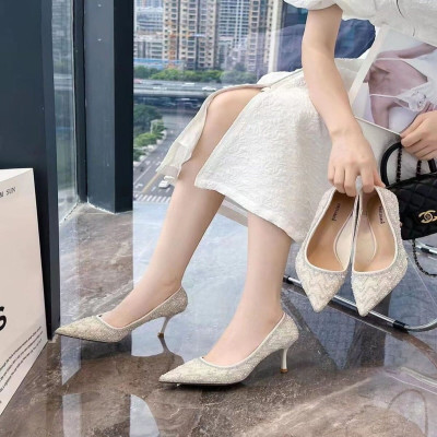 ‎ حذاء نسائي بكعب عالي باللون الفضي