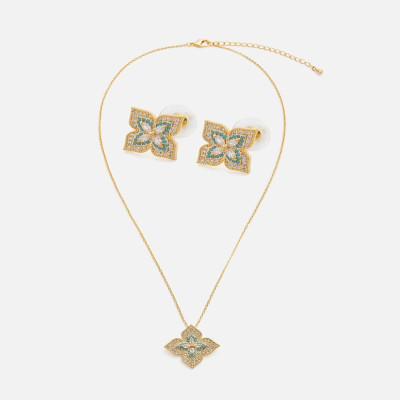 ‎ طقم نسائي أنيق باللون الذهبي