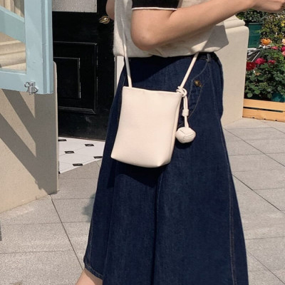 ‎ شنطة نسائية من الجلد بلون بيج