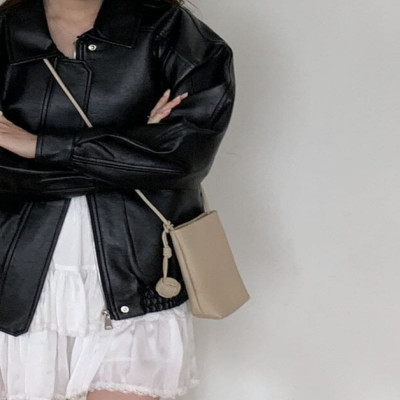 ‎ شنطة نسائية من الجلد بلون بني