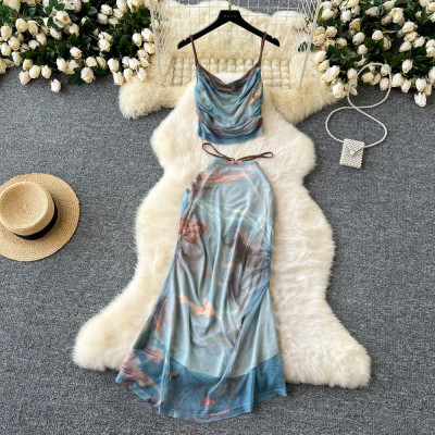 طقم بلوزة وتنورة بدون أكمام للنساء