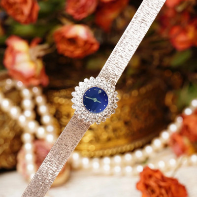 ساعة نسائية فريدة من نوعها بسوار فولاذي مطلية بالذ...