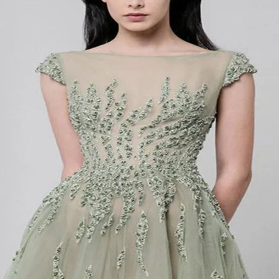 فساتين سهرة ربيعية 2025 شفافة برقبة قارب مزينة بال...