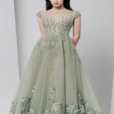 فساتين سهرة ربيعية 2025 شفافة برقبة قارب مزينة بال...