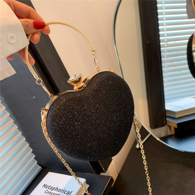 شنطة قلب لامعة