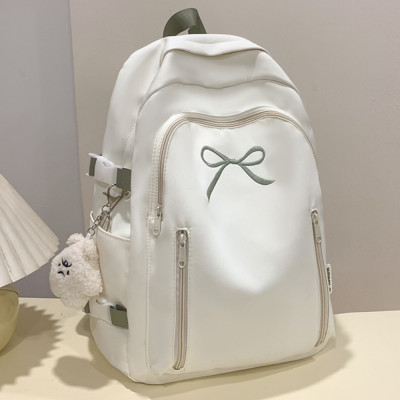 امرأة رجل كتاب على ظهره حقائب الكتب المدرسية للمرا...