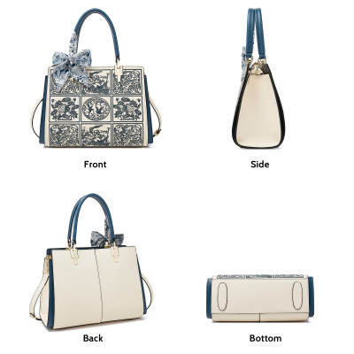 حقيبة يد نسائية مطرزة من الجلد المنفصل من FOXER عل...