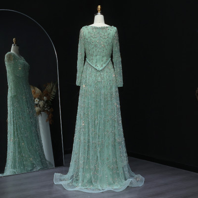 شارون سعيد فستان سهرة عربي فاخر مطرز باللون الأخضر...