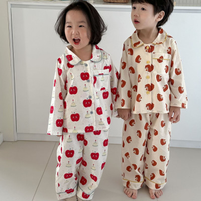 Children's home clothes with cartoon drawings